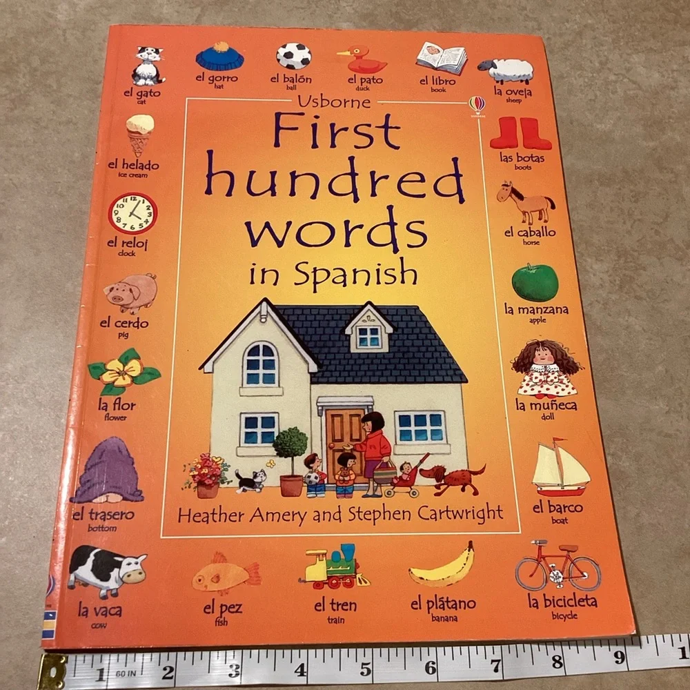 Usborne First Hundred Words in Spanish by Heather Amery and Stephen Cart…